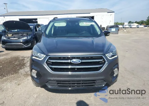 2017 Ford Escape Titanium z USA, uszkodzony, nr VIN 1FMCU9J99HUE93325